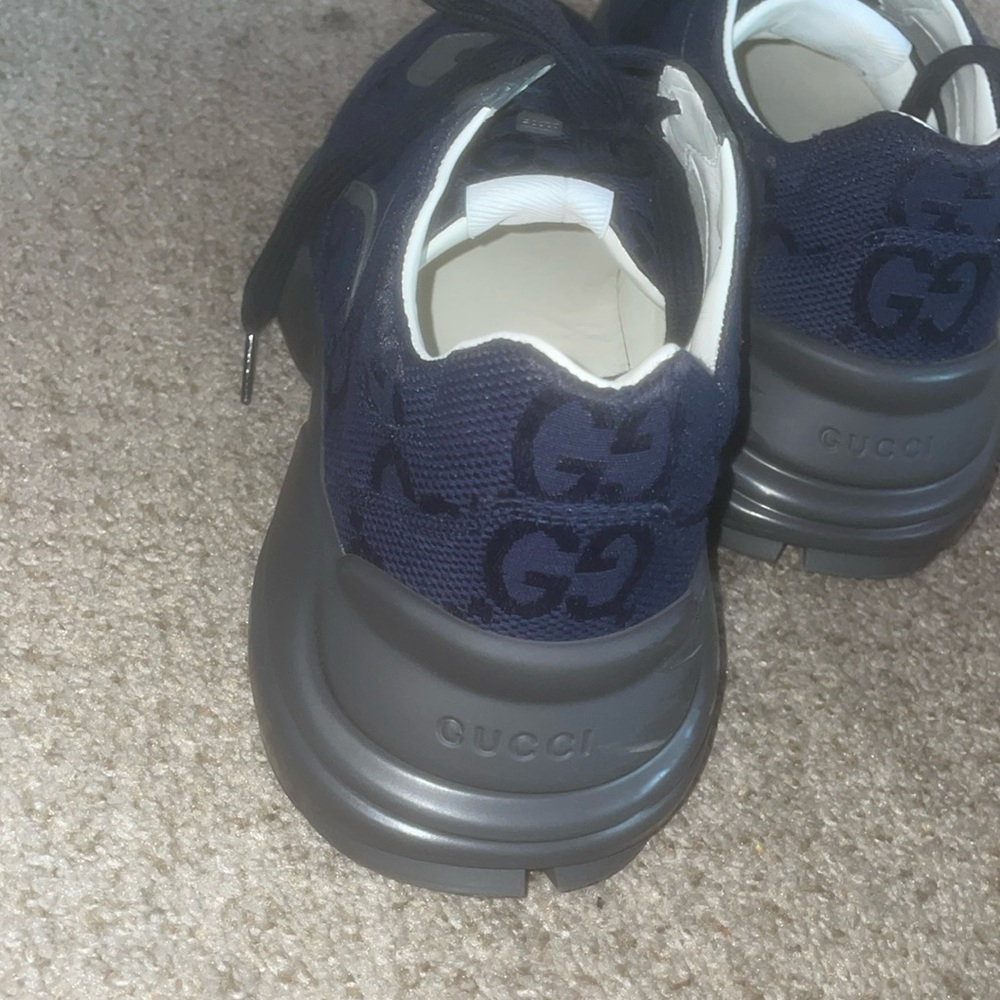 I'm Selling these Navy Blue Gucci Sneakers. Wore twice and still Good condition